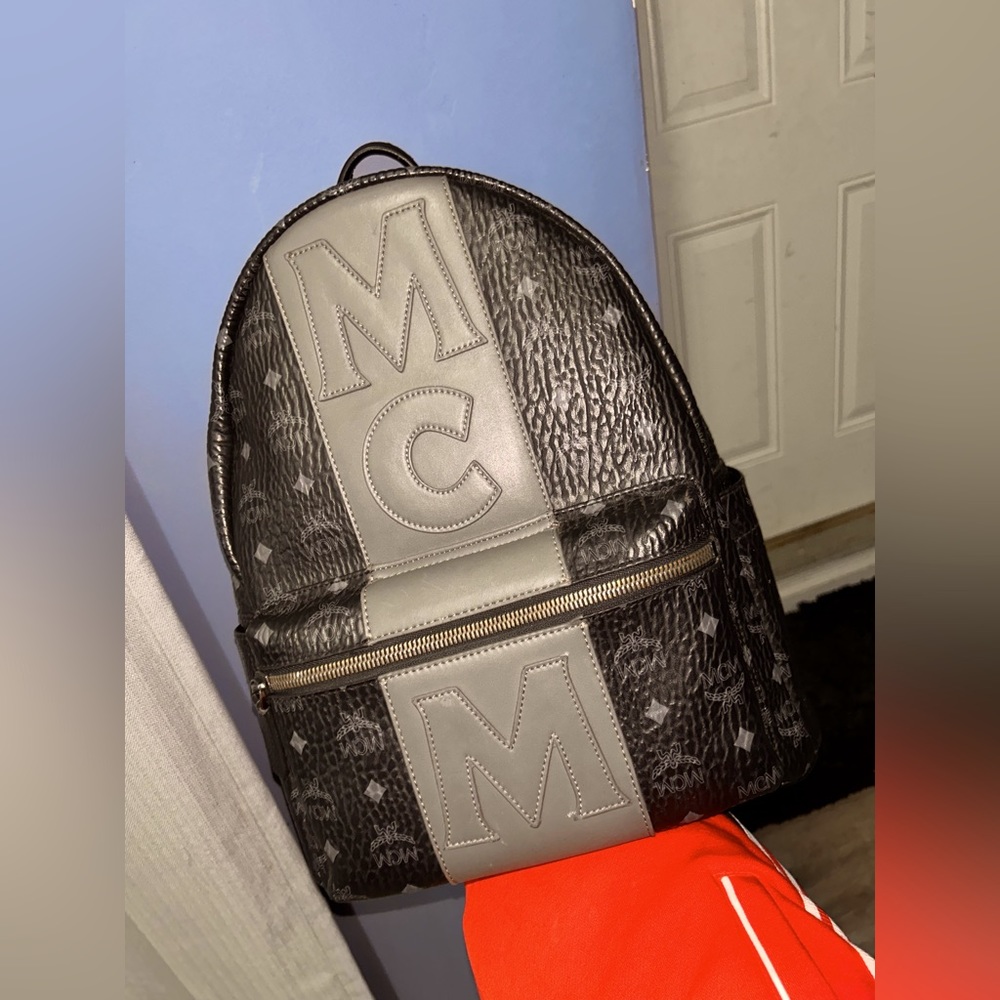 Black and grey Mcm bag pack